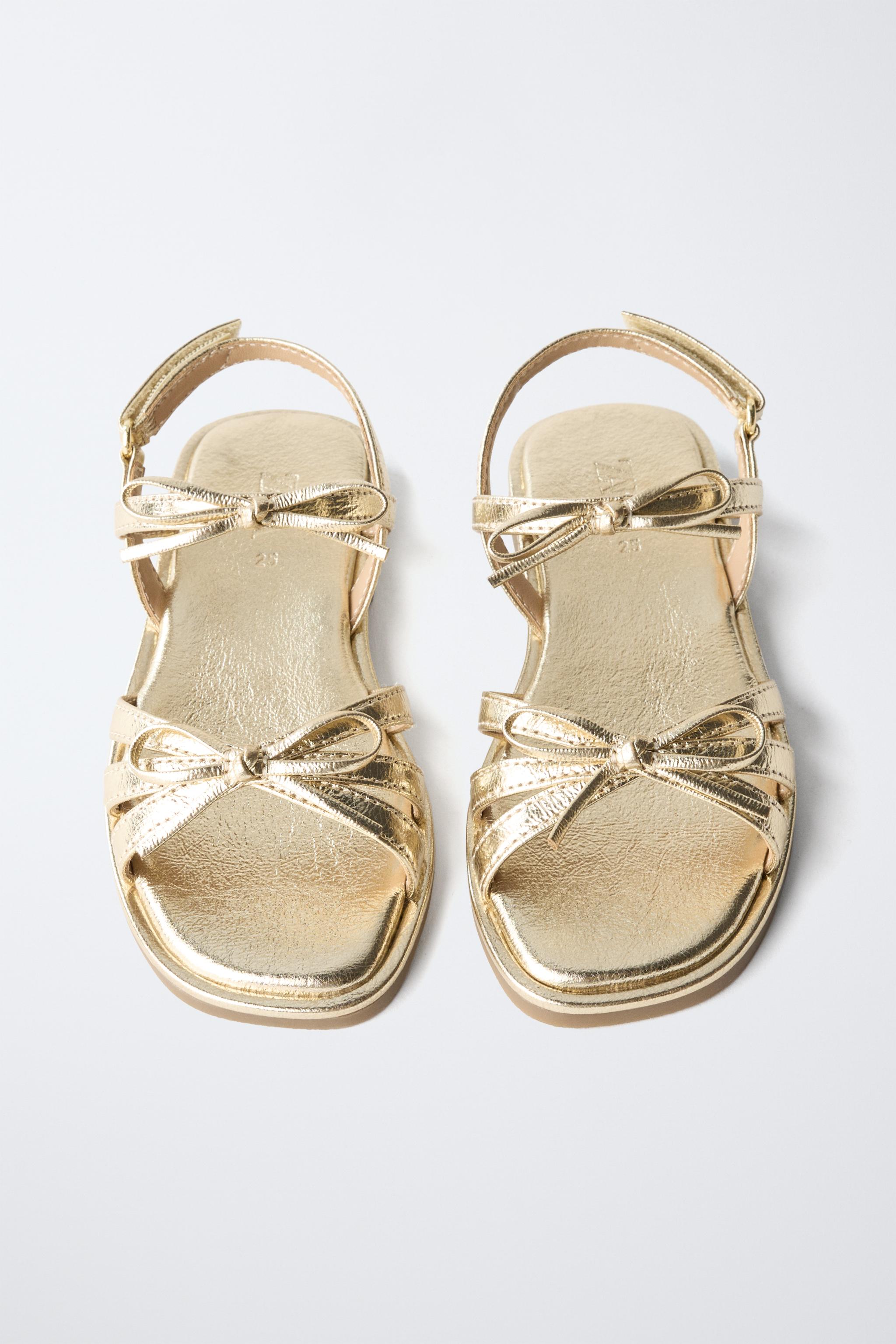 METALLIC BOW SANDALS